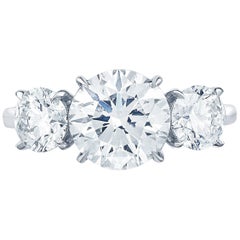 Marisa Perry Three-Stone Round Brilliant Engagement Ring in Platinum