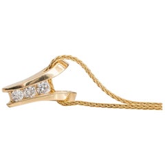 1950s 0.25 Carat Diamond 14 Karat Gold Pendant Necklace
