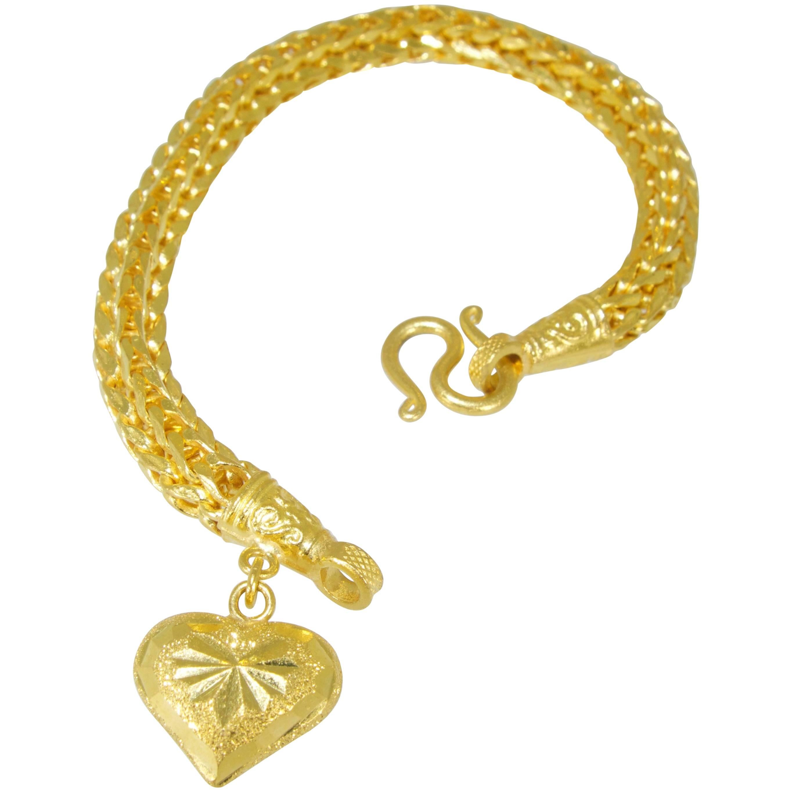Gold Braided Bracelet with Heart Shaped Charm