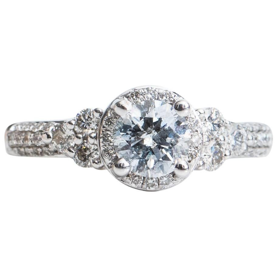 1.20 Carat Diamond Halo and 14 Karat White Gold Engagement Ring For Sale