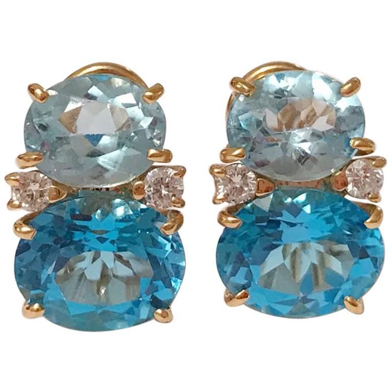 Boucles d'oreilles Gum Drop de taille moyenne avec topaze bleue bicolore et diamants