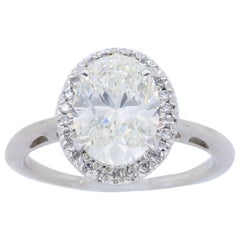 GIA Certified Oval Cut Diamond Halo Engagement Ring