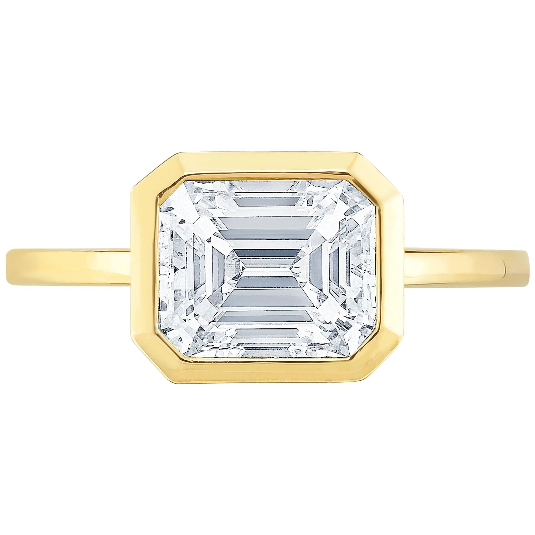 East West Emerald Cut Diamond in Yellow Gold For Sale