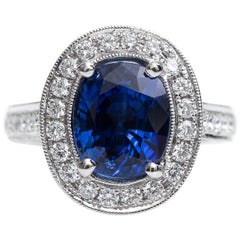 GIA Certified 3.75 Carat Cushion Oval Sapphire and Diamond Halo Ring