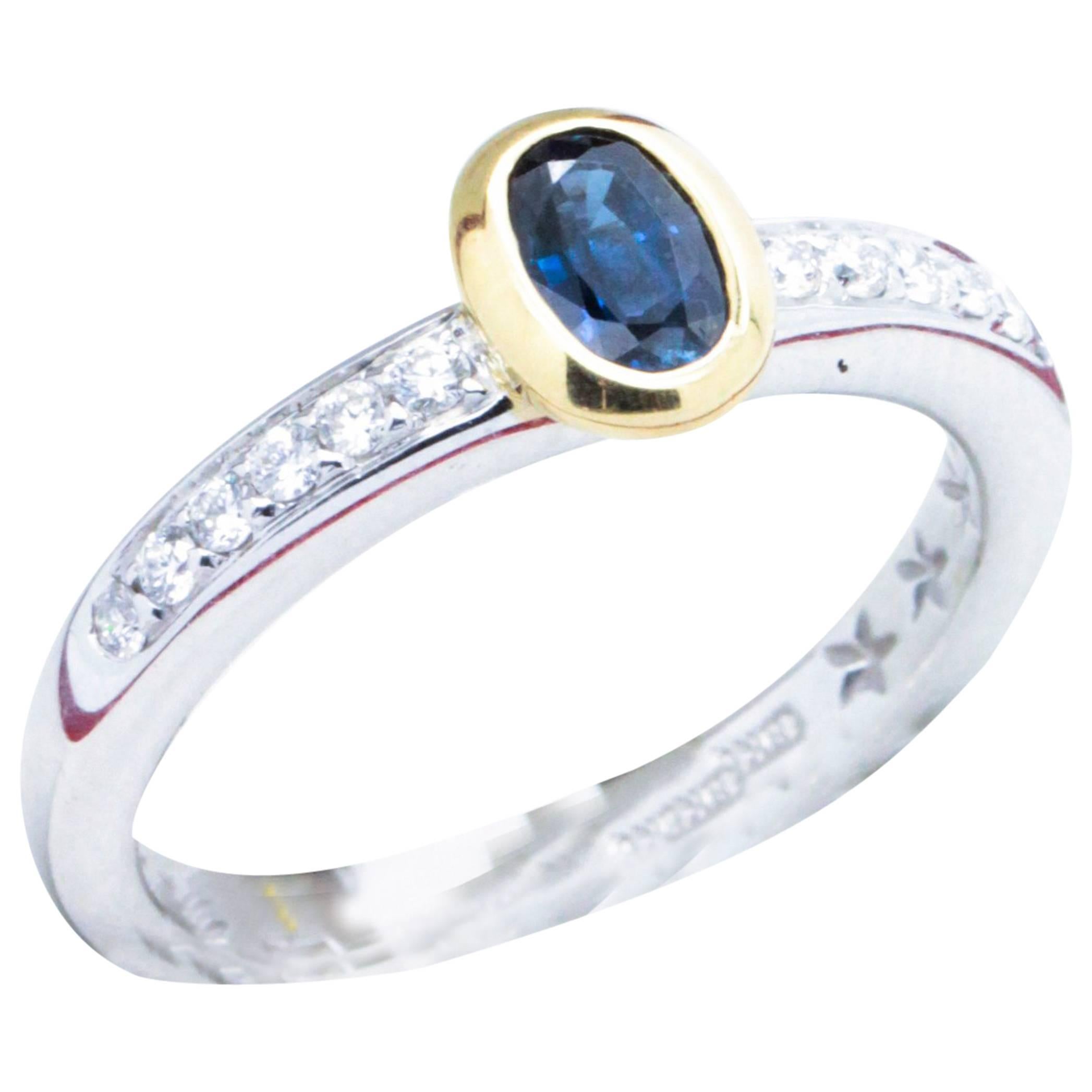 Substantial Sapphire and VS1 G Diamond two tone 18kt Gold Engagement Ring For Sale