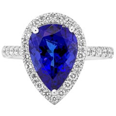 Tanzanite Diamond Single Halo Gold Ring