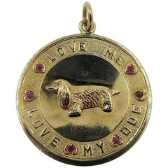 Ruby and Gold Pendant Depicting a Dachshund Inscribed Love Me Love My Dog