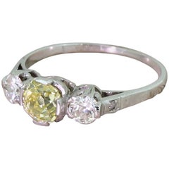 Art Deco 1.32 Carat Fancy Greenish Yellow and White Old Cut Diamond Trilogy Ring