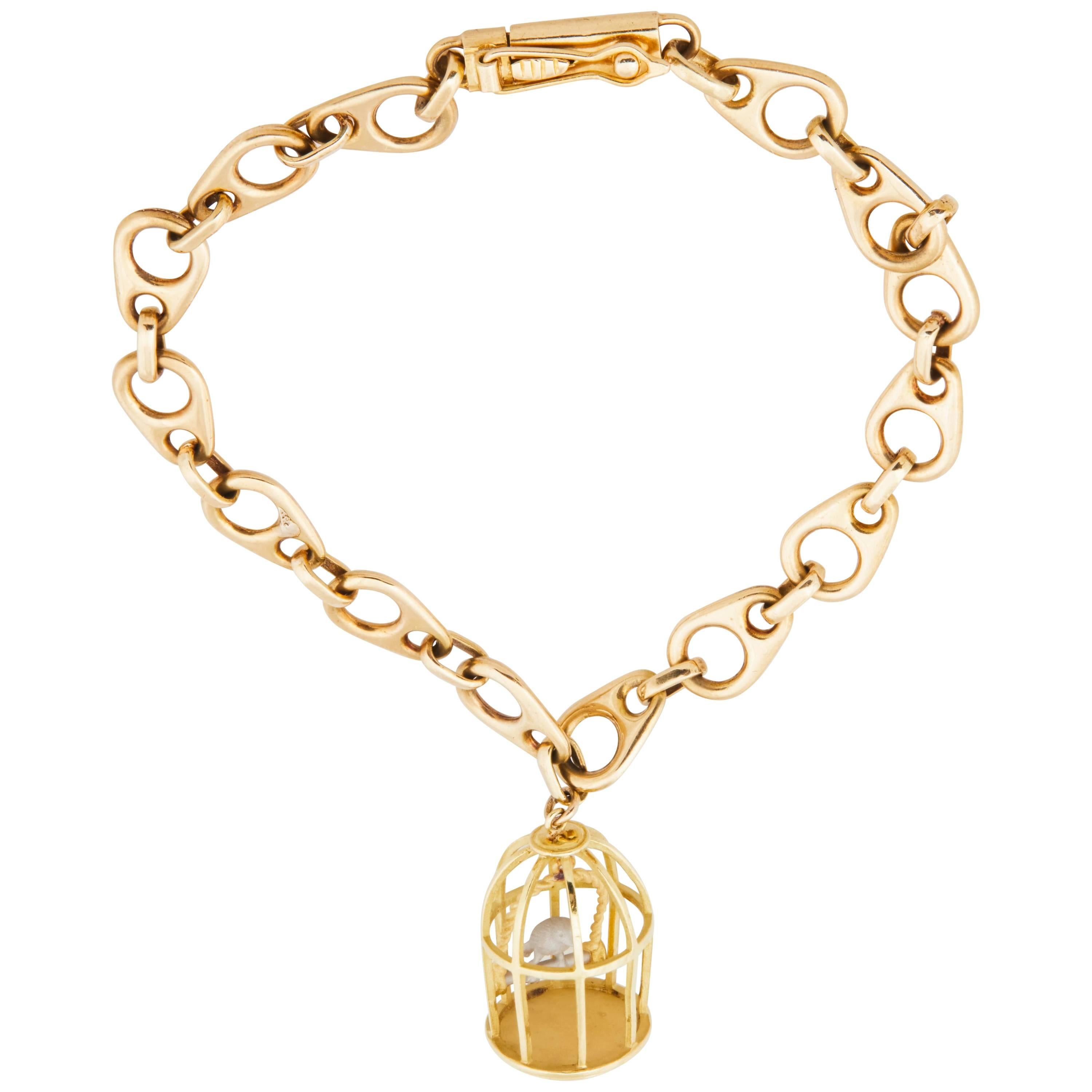 1960s French 18 Karat Gold Link Bracelet with Vintage Gold Birdcage Charm
