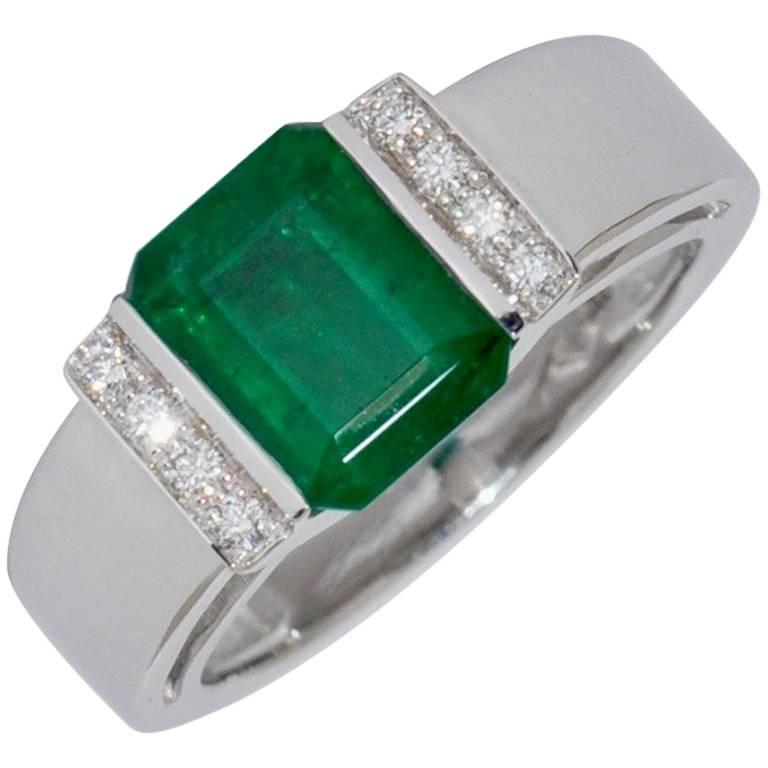 Emerald and Diamonds White Gold Engagement Ring