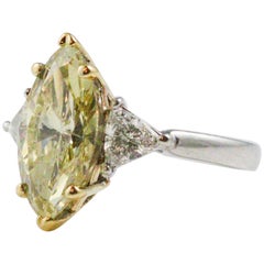 3.60 Carat GIA Certified Marquise Cut Fancy Light Brownish Yellow Diamond Ring