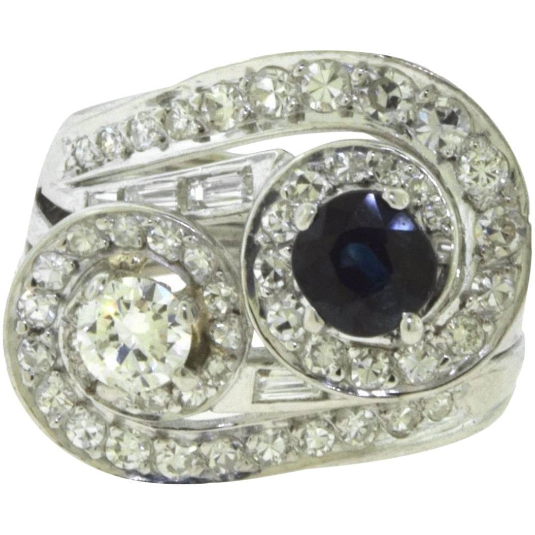 Diamond and Sapphire Center Stone Diamond White Gold Swirl Ring For Sale