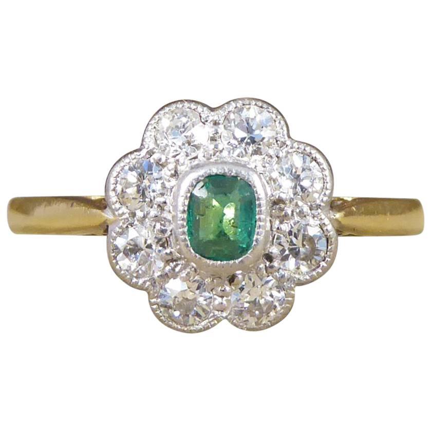 Emerald and Diamond Cluster Ring in Platinum and 18 Carat Gold, circa 1930s