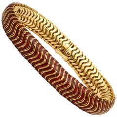 1960s Flexible and Articulated Iridescent Red Enamel and Gold Serpent Bracelet