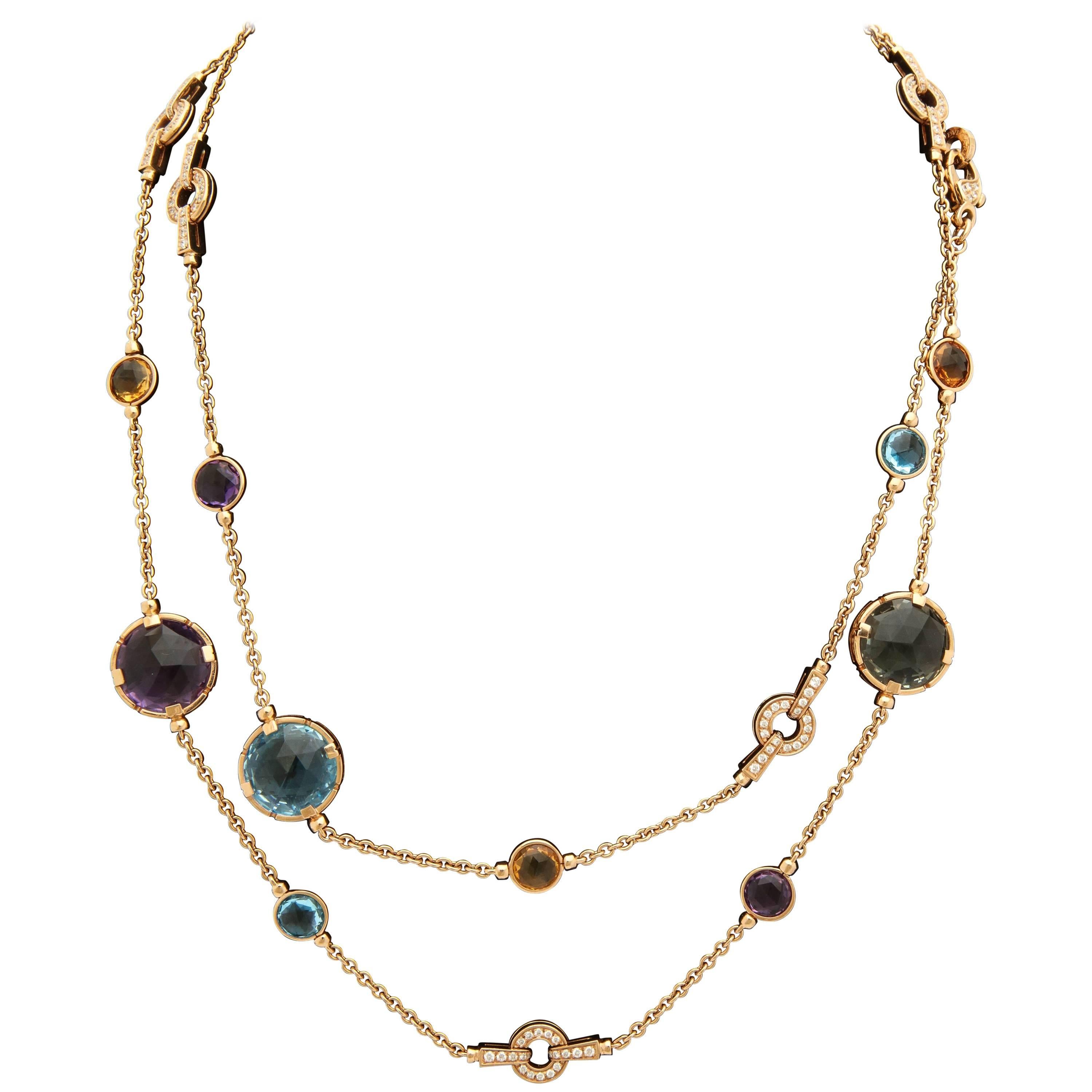 One Ladies Long 18kt Rose Gold Link Chain Flexible And Articulated Necklace Embellished With Bezel Set And Prong Set Blue Topaz Stones,Amethyst Stones Citrine Stones And Light Green Tourmaline Stones. Note All Colored Stones Are Cut In A Briolette
