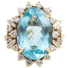 7 Carat Oval Aquamarine with Diamond Halo 18 Karat Yellow Gold Ring