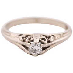 1940s 0.20 Carat Diamond and 14 Karat White Gold Engagement Ring
