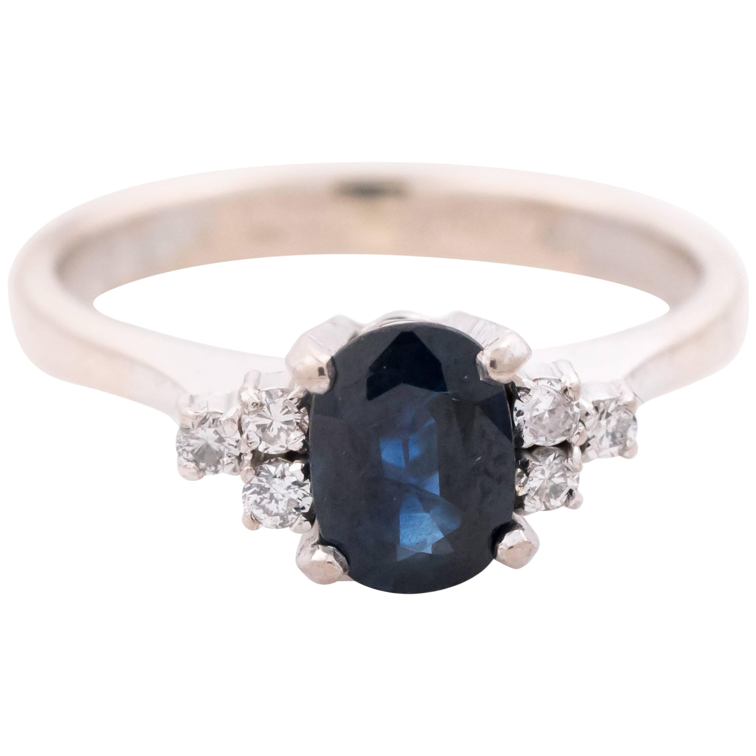 1950s 1 Carat Oval Blue Sapphire and Diamond 18 Karat White Gold Ring