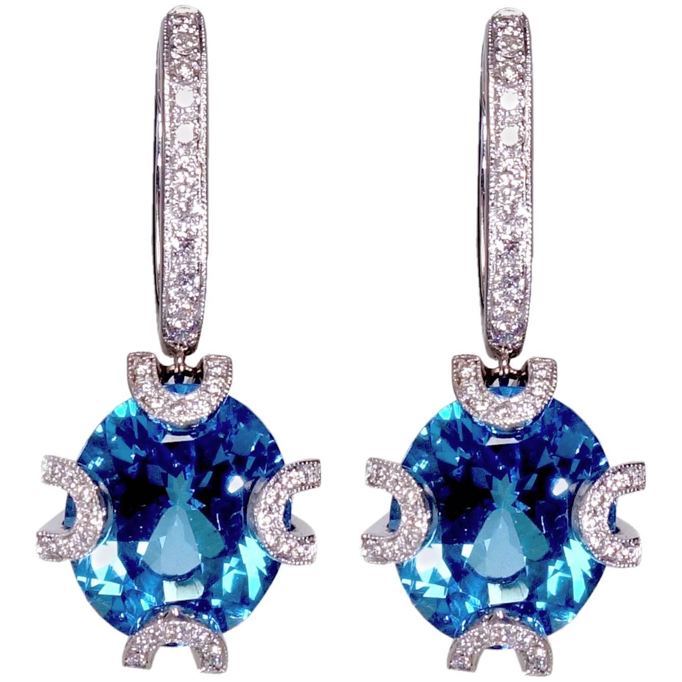 Highly Crafted 18K Gold Diamond Earrings with Electric Blue Zircon Color Stones For Sale