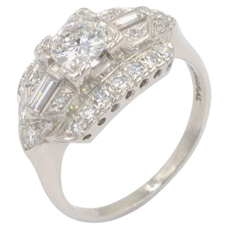 Vintage 1950s 0.46 Carat Diamond Center and Platinum Engagement Ring For Sale