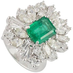 Asymmetrical Diamond and Emerald Ring