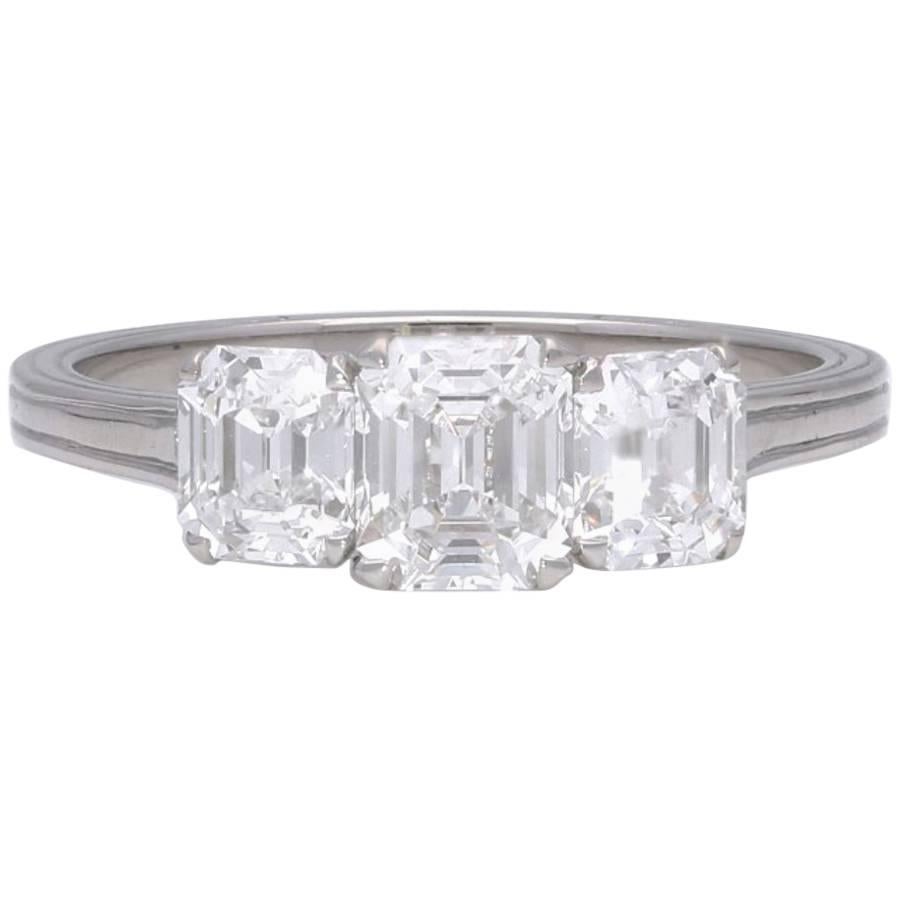 1.50 Carat Three-Stone Emerald-Cut Diamond Ring Set in Platinum