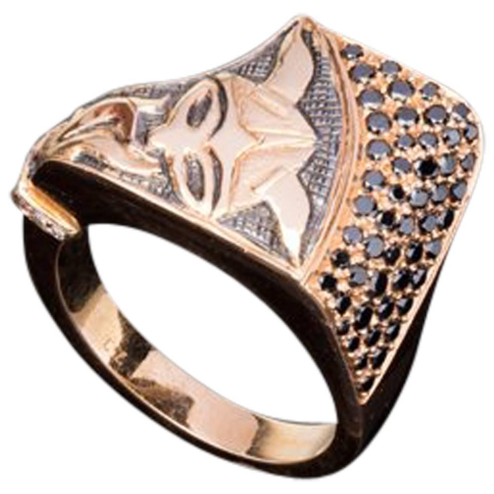 Hand carved  18K rose gold ring with black diamonds. The Viking figure symbolises warrior and sailor tribes.