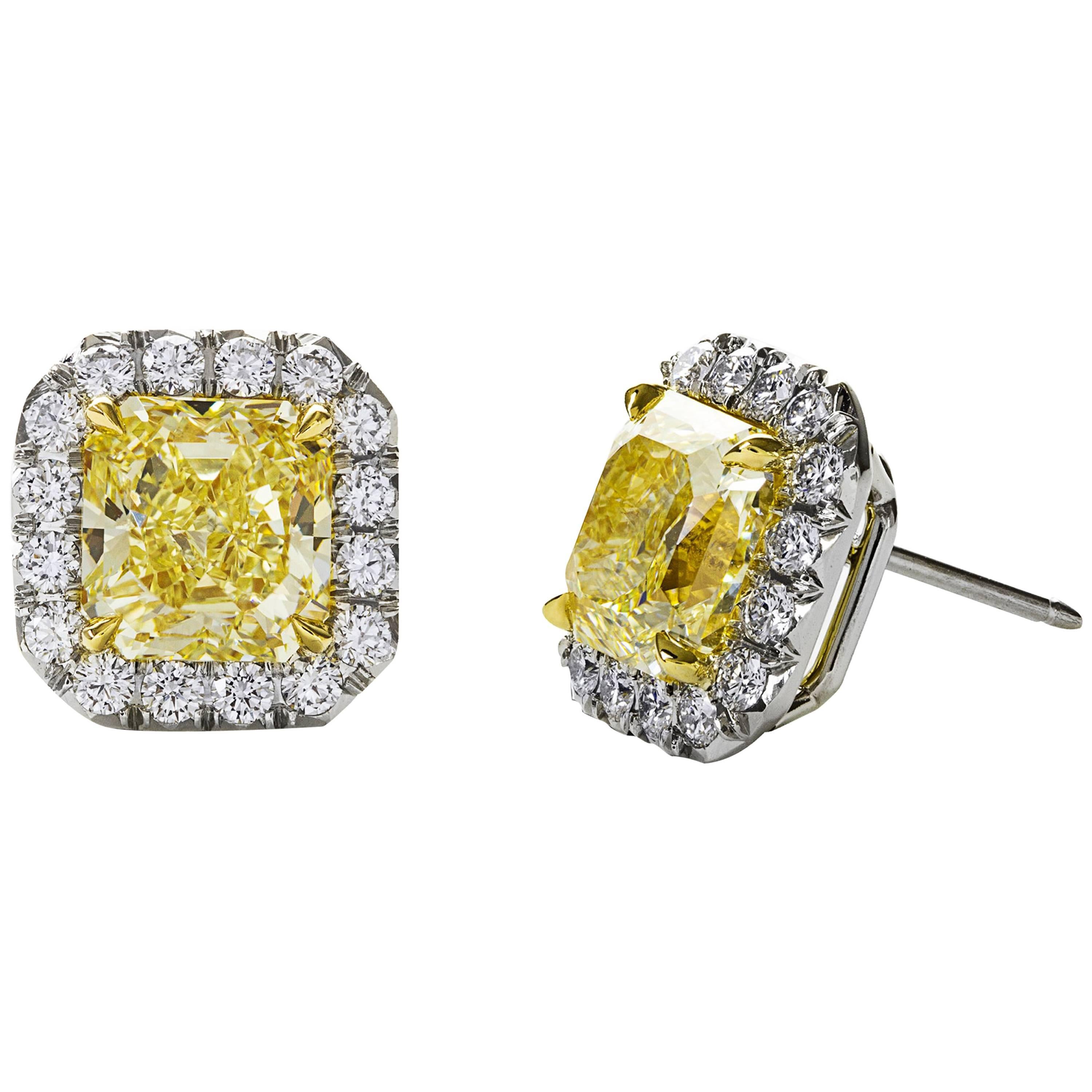 GIA Certified 5.50 Carats Total Radiant Cut Fancy Yellow Diamond Stud Earrings For Sale