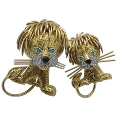 1970s Van Cleef & Arpels "Lion" Diamond Emerald Black Enamel Gold Brooches