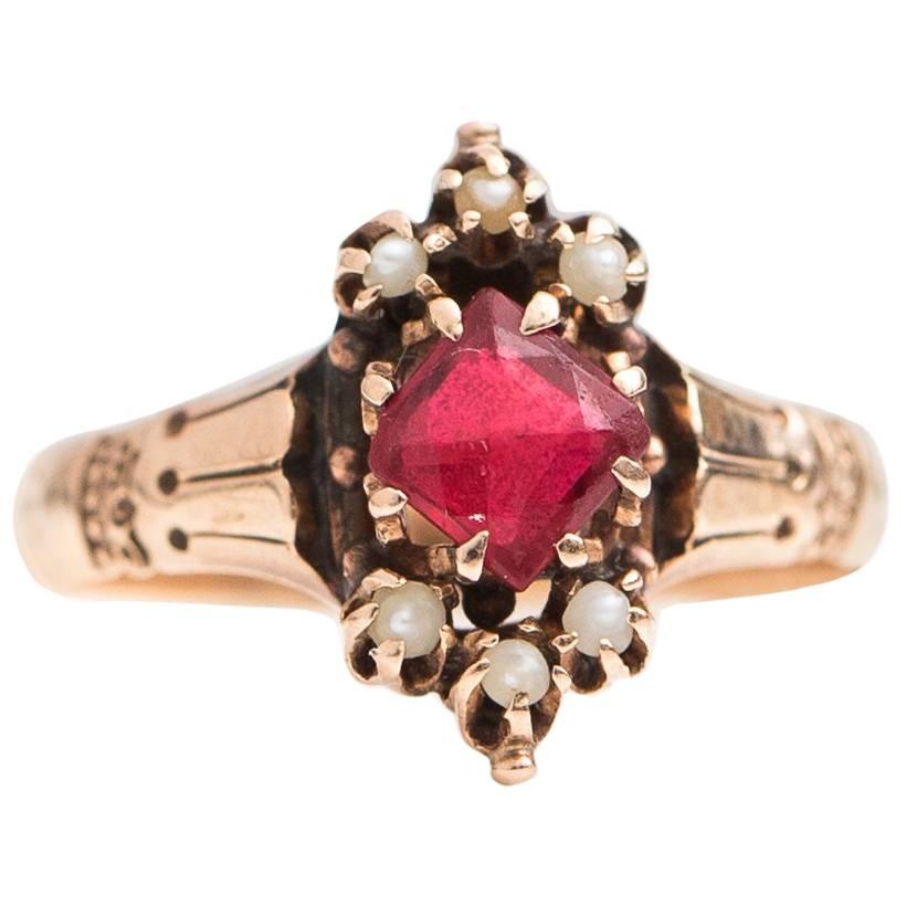 1890s Victorian Simulated Ruby and Natural Seed Pearl 9 Karat Yellow Gold Ring