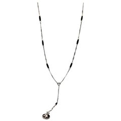 Edwardian Lorgnette, Pearl Onyx Necklace with Double-Sided Charm Platinum