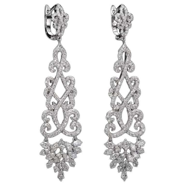 Classic Diamond Chandelier Earrings 4.22 Carat Total Diamond Weight. 
Our handcrafted earrings will compliment everybody's wardrobe, they can complete a red carpet look and upgrade a casual look. 
The earrings are set with high quality round