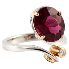 Kian Design 18 Carat Three Stones Oval Rhodolite and Round Diamond Ring