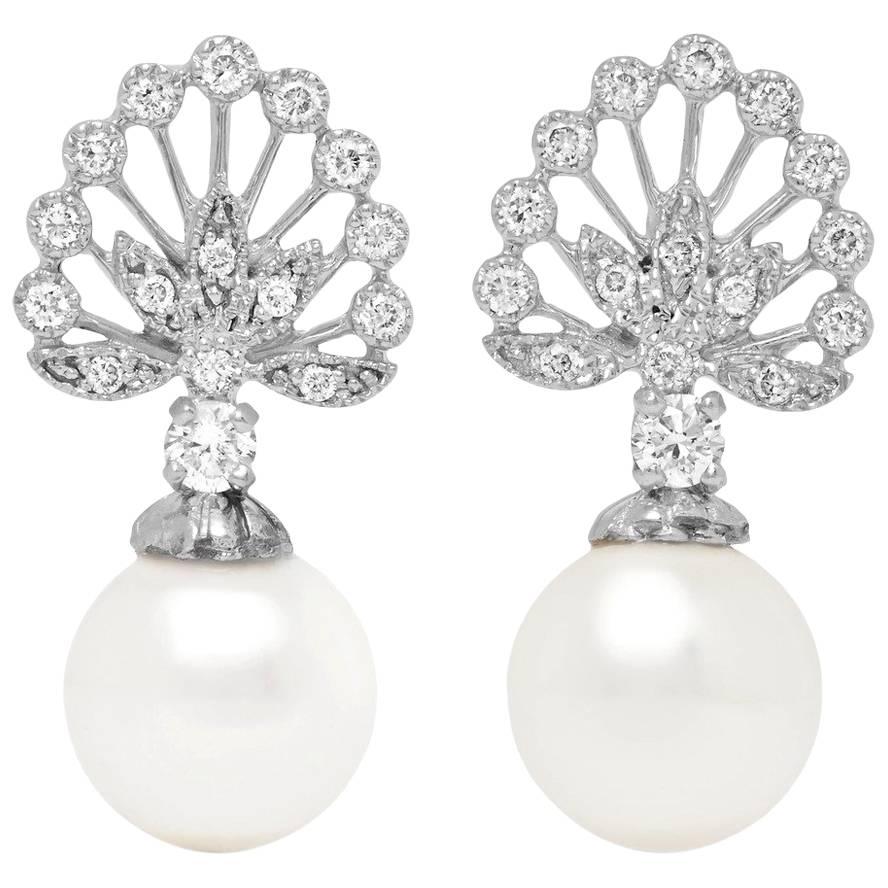 Yvonne Leon's Earrings with Diamonds and Pearls in 18 Carat White Gold