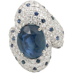 GIA Certified 21.98 carat Burmese Sapphire and Panther-style Diamond Ring