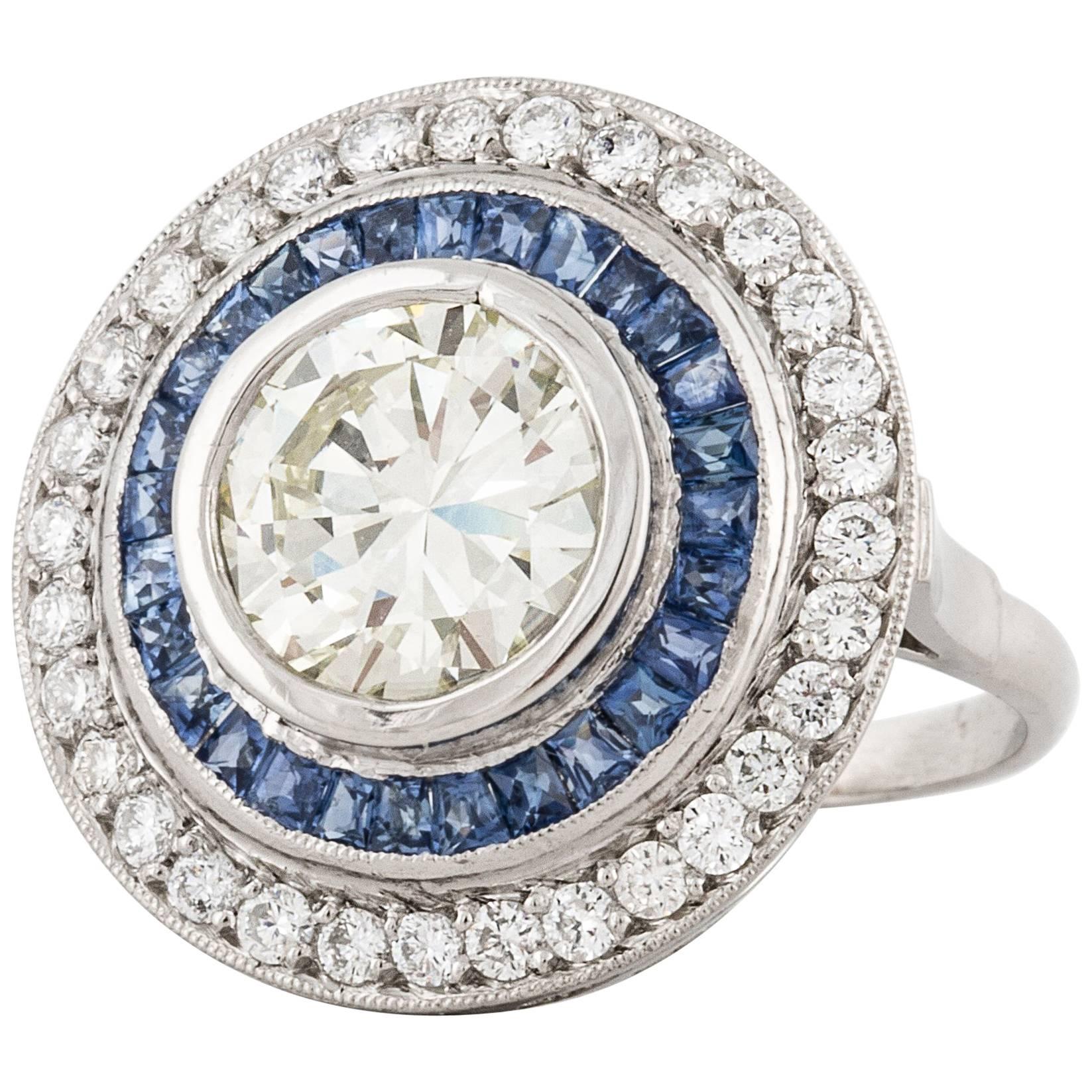 Contemporary Diamond and Sapphire Target Ring in Platinum For Sale