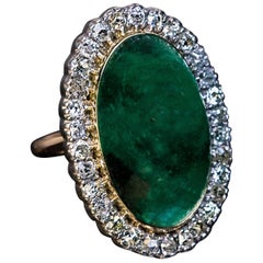 Émeraude ancienne de 19 carats taillée en cabochon  Bague en diamant