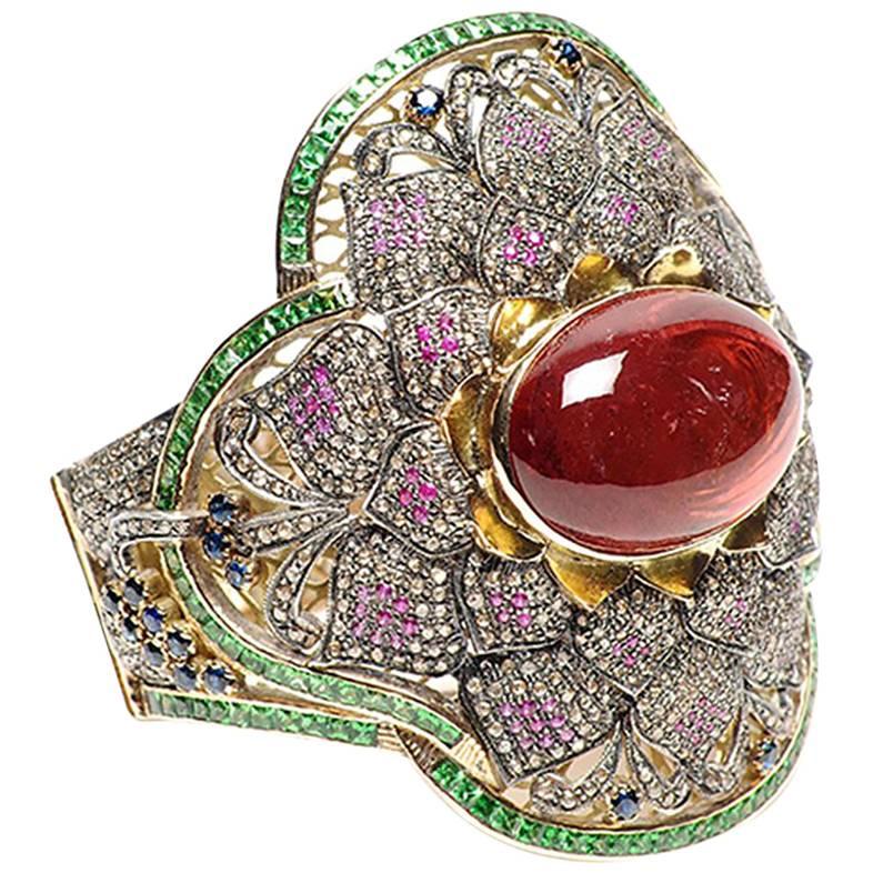 Bracelet lotus en or 14 carats, tourmaline, saphir rose et diamants