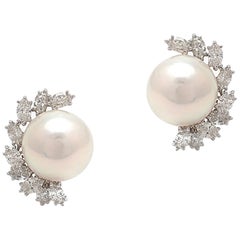 Elegant Pearl and Diamond Earrings in Platinum