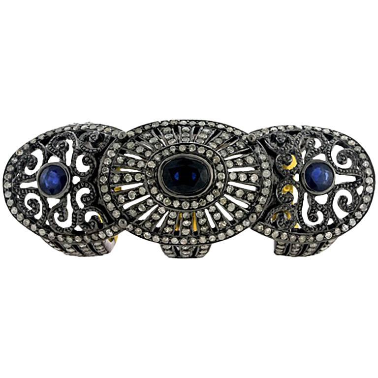 Sapphire and Diamond Gladiator Ring in 18 Karat Gold For Sale