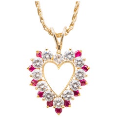 1970s Heart Shape Diamond and Ruby 14 Karat Yellow Gold Necklace