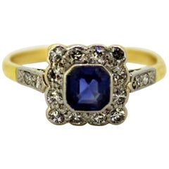 18 Karat and Platinum Ladies Ring with Blue Sapphire and Diamonds