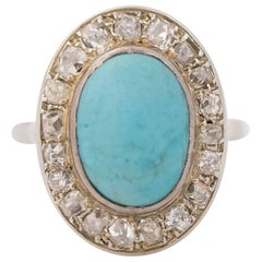 1930s Diamond and Turquoise 14 Karat White Gold Halo Ring