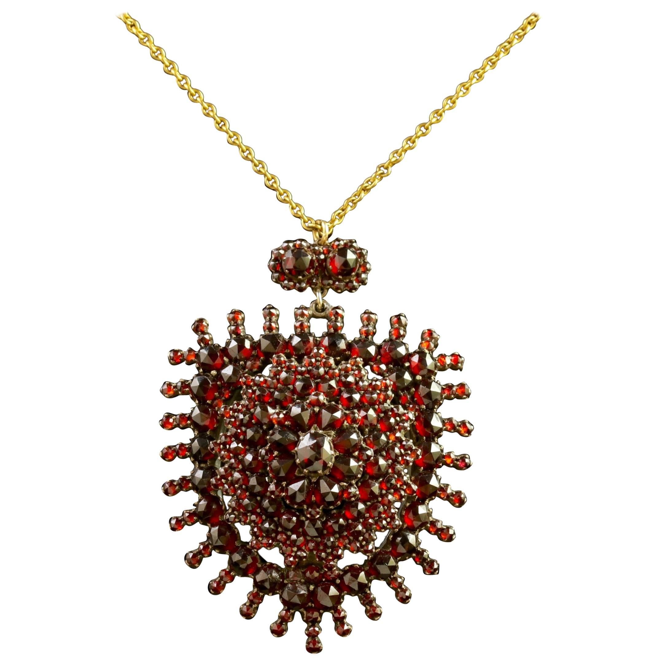 Antique Victorian Garnet Pendant Locket and Gold Chain, circa 1890 For Sale