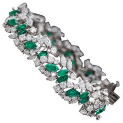 1960s 19 Carat Diamond and 6 Carat Emerald Platinum Bracelet