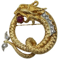 Broche Dragon en or:: rubis et diamants Lalaounis