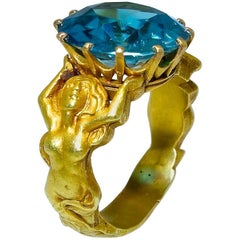 Antique Highly Sculpted Art Nouveau Mermaid Ring centering a Very Fne Zircon