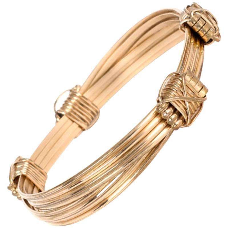 Solid 14 Karat Gold Adjustable Elephant Knot Bangle Bracelet For Sale