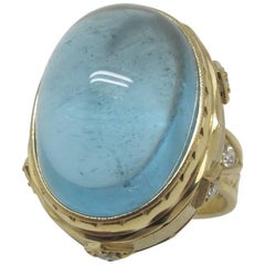 26.12 Carat Aquamarine Cabochon Ring 18 Karat Yellow Gold with Diamonds