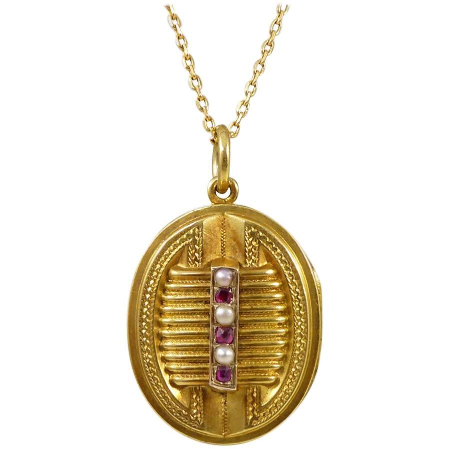 Antique Victorian Pearl Garnet Pendant Locket on a 15 Carat Gold Chain